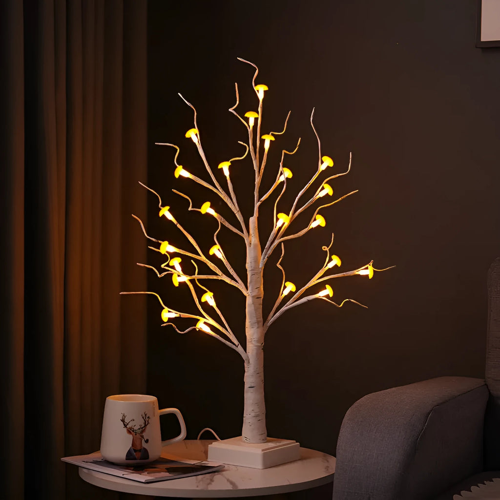 60cm tall white LED birch tree lamp with 24 small plastic mushroom-shaped warm white lights.