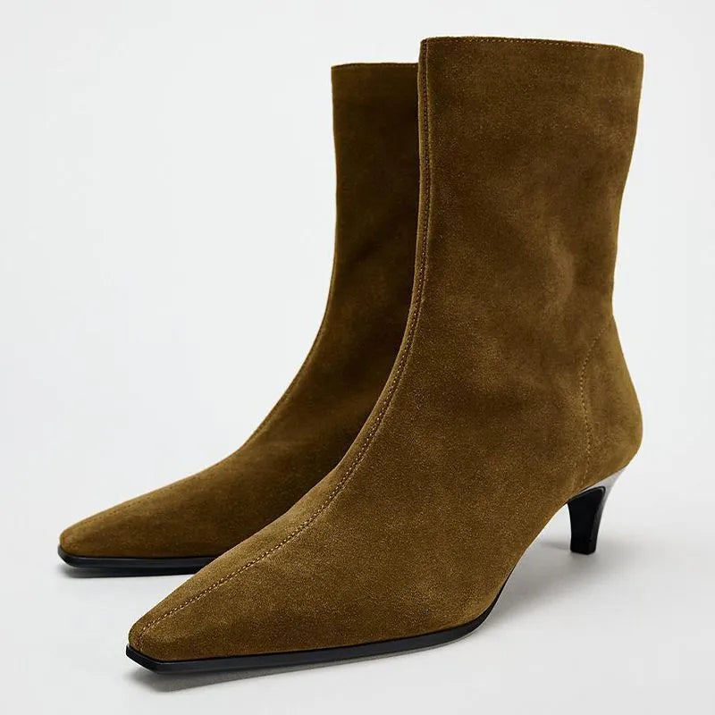 Brown square toe mid-heel ankle boot with side zipper and waterproof platform sole.