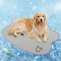 Light gray dog head shaped ice silk cooling mat for pets on a wooden floor