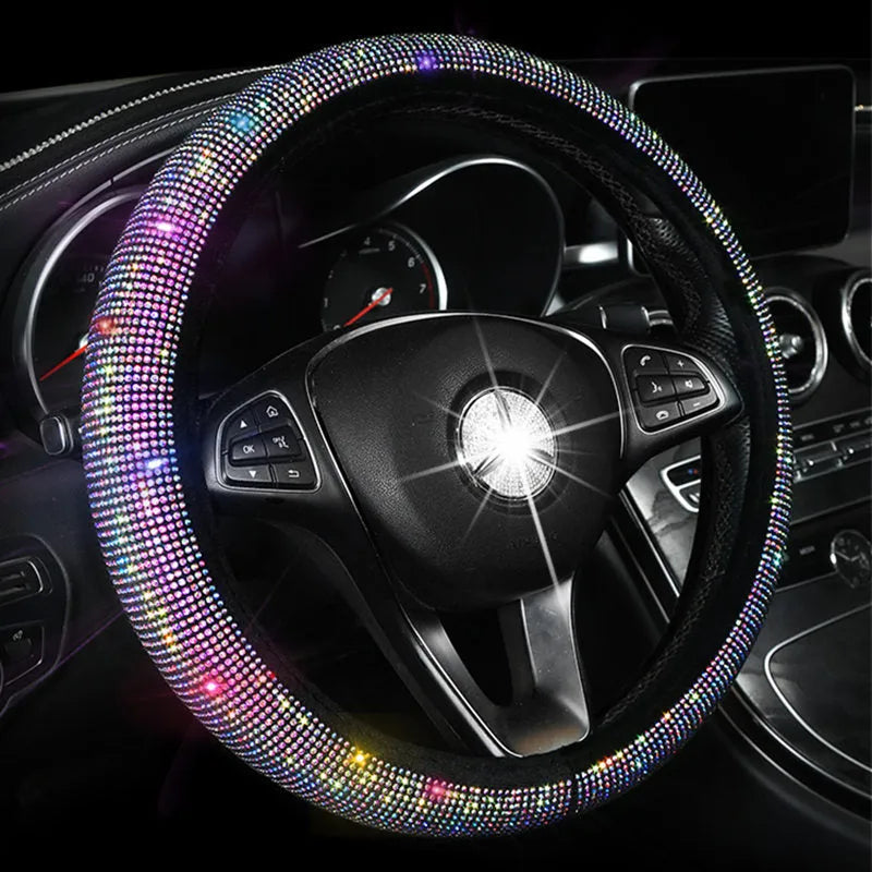 Four piece car interior accessory set with rhinestone crystals, including steering wheel, gear shift, handbrake and seat belt covers