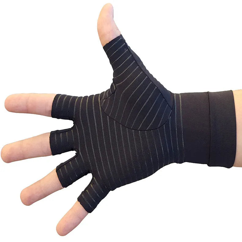 Black copper fibre compression gloves for arthritis, full finger style, showing stretch fabric and textured palm