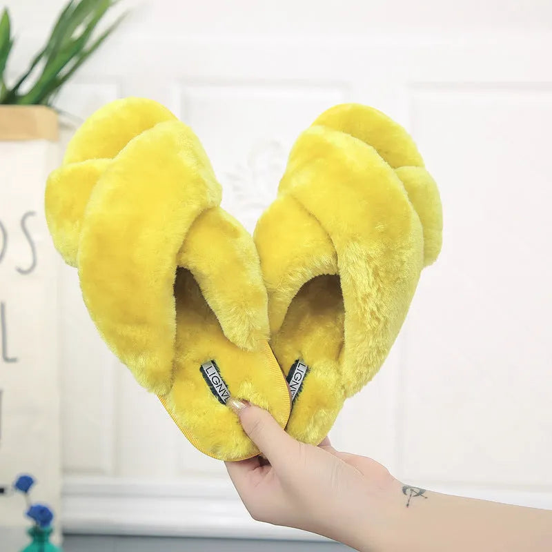 Women's cross open-toe fur slippers in multiple colours on a patterned non-slip rubber sole.
