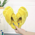 Women's cross open-toe fur slippers in multiple colours on a patterned non-slip rubber sole.
