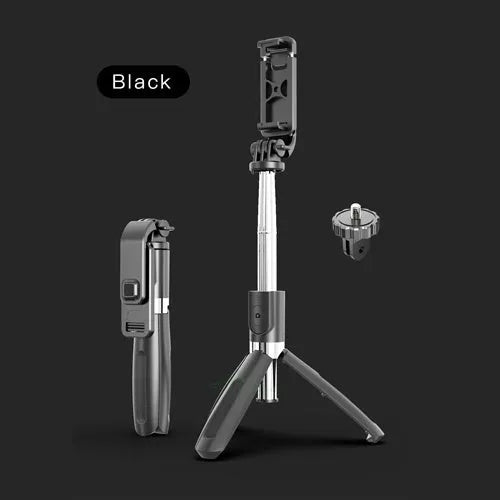 Black and white Bluetooth selfie stick with wireless remote, extended with phone mounted on 360-degree head and tripod base deployed.
