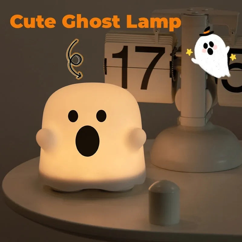 Silicone touch sensor LED night light on a bedside table showing soft glow.