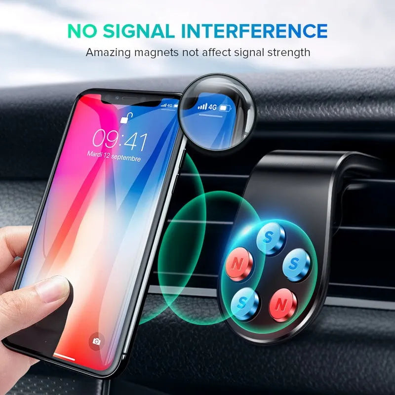 Black universal car phone holder bracket mounted on a car dashboard holding a smartphone.