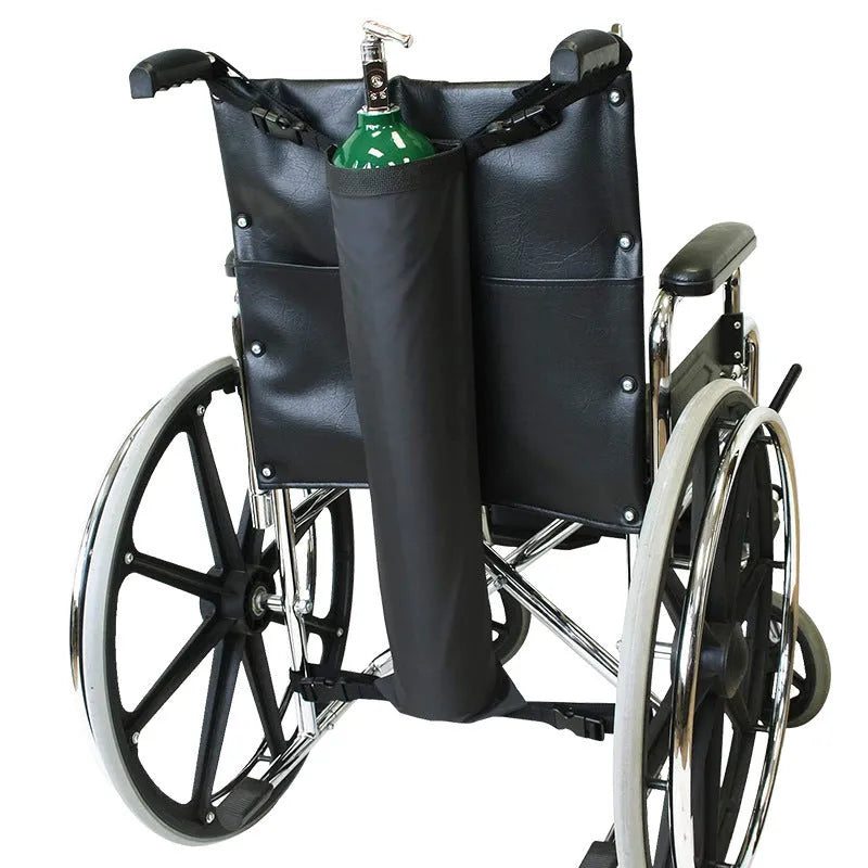 Black cylindrical wheelchair pannier bag for oxygen cylinder storage during travel