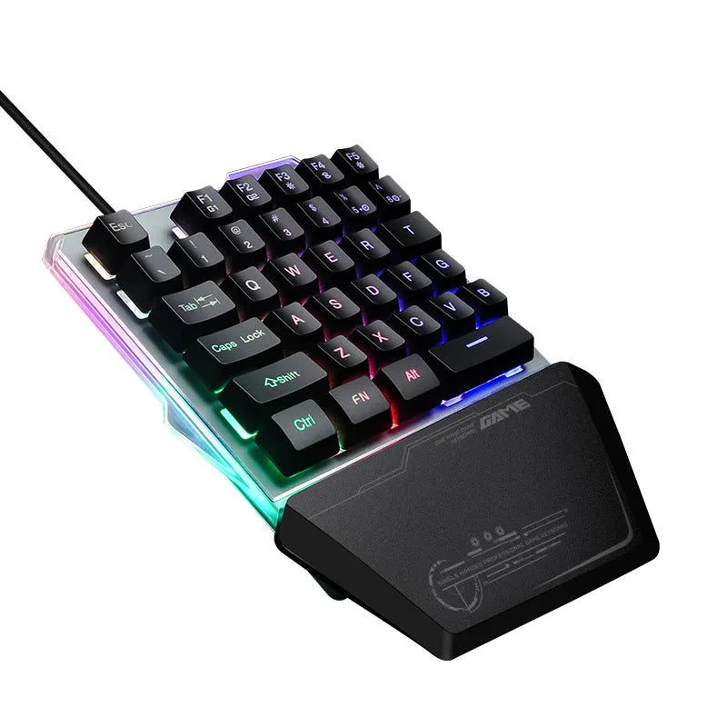 Black G40 Flow one-handed robotic keyboard with RGB backlit keys on a desk.