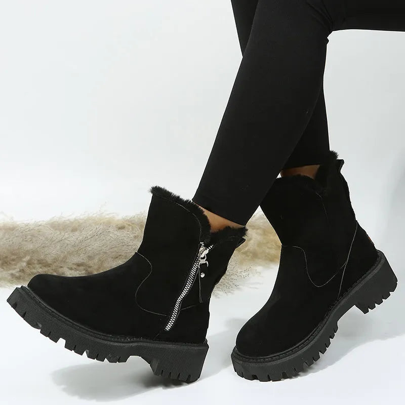 Women's high-top snow boots in black with side zip and thick plush lining