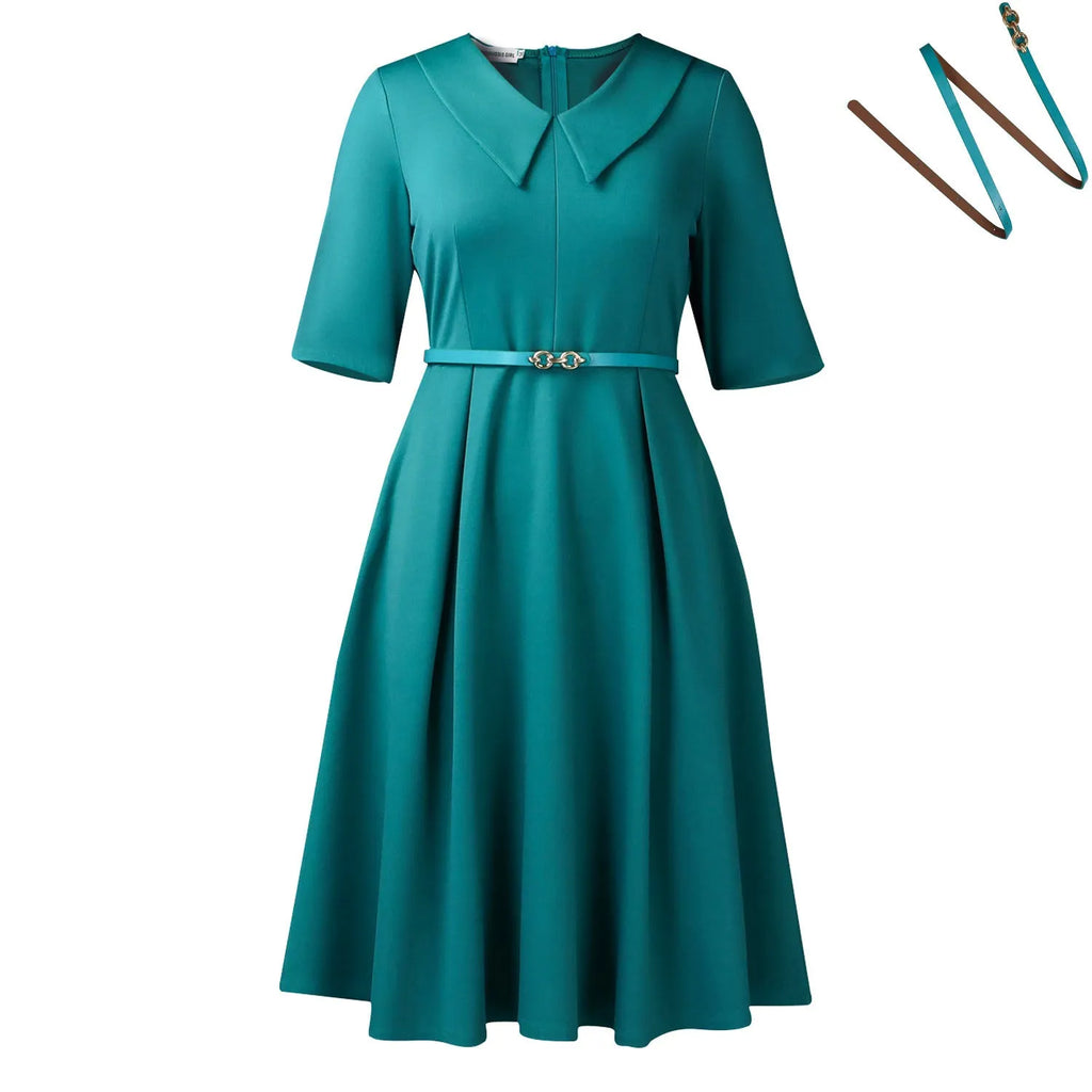 Women's solid colour African dress with high waist and matching belt in polyester fabric.