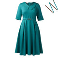 Women's solid colour African dress with high waist and matching belt in polyester fabric.