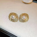 Women's vintage flower earrings with exaggerated pearl irregular design on alloy