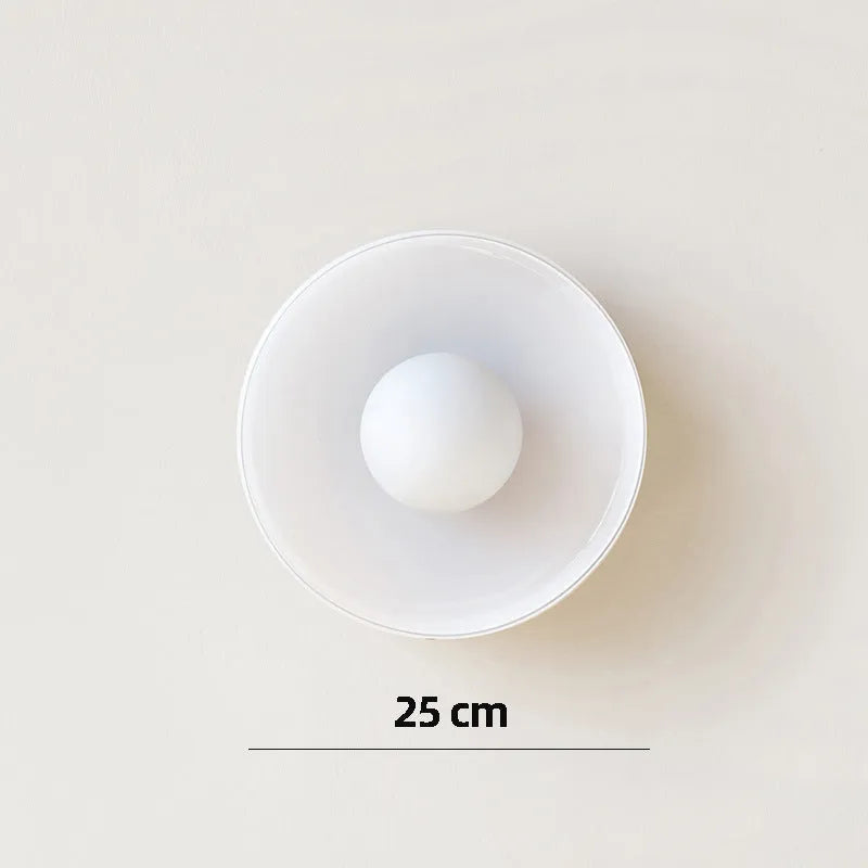 White round glass ceiling light fixture with a 25cm diameter shade.