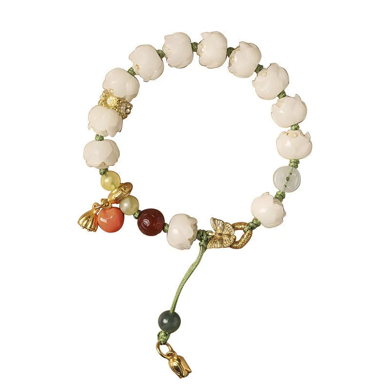 Hand-woven white jade bodhi bracelet with lotus and large pumpkin beads on a single ring open rope.