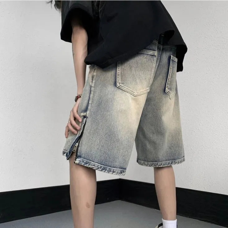 Blue retro distressed denim shorts with wide-leg loose fit on Asian size mannequin