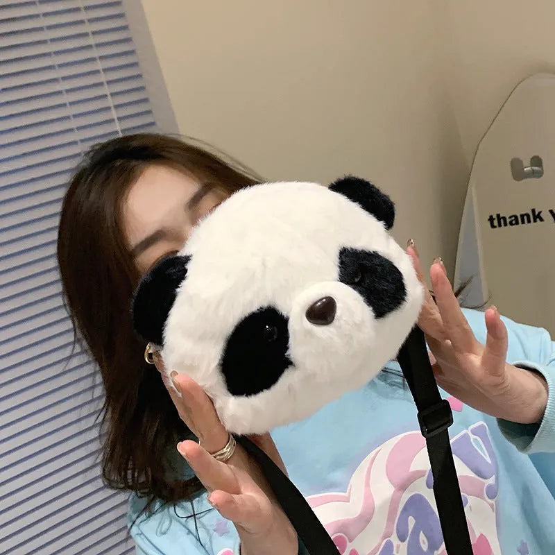 Soft plush Panda Head design cylindrical crossbody bag showing front view and pocket.