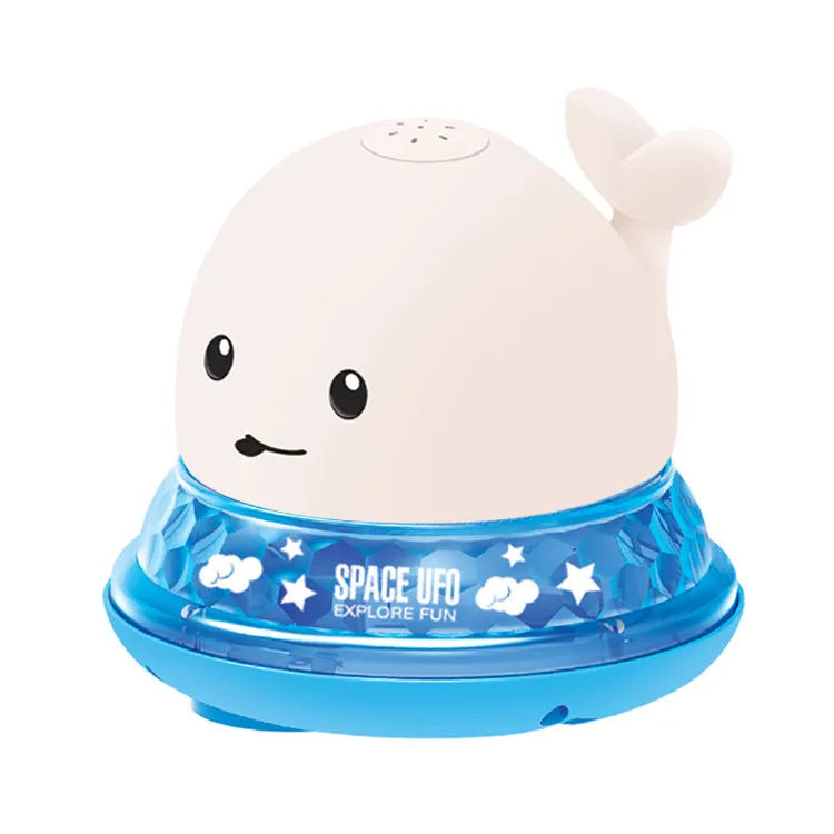 Floating grey and white whale bath toy spraying water with LED lights
