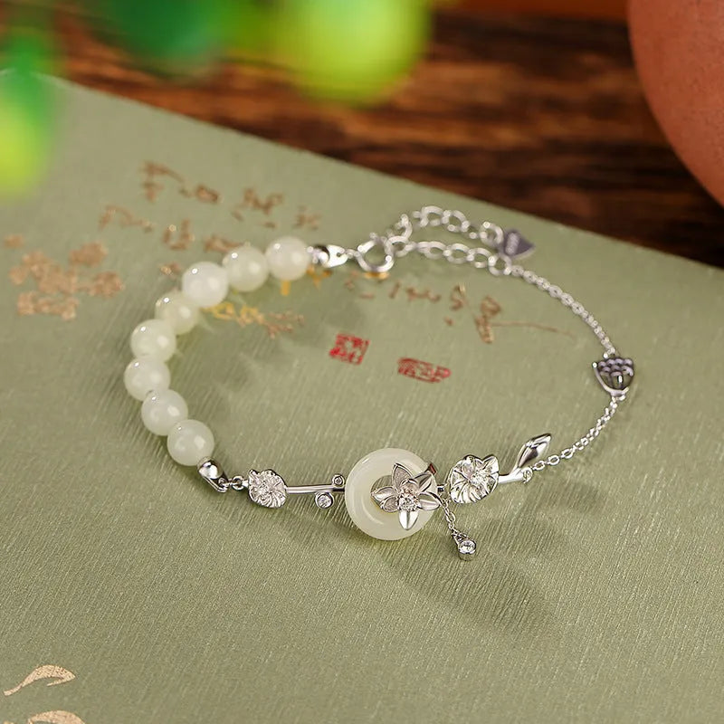 Women's silver bracelet with Hetian jade peace buckle design in gold or silver plating