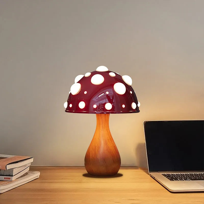 Modern mushroom-shaped table lamp with a touch dimming base on a wooden surface.