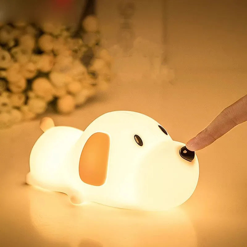 Silicone cartoon dog night light with two-tone design, shown with USB charging cable.