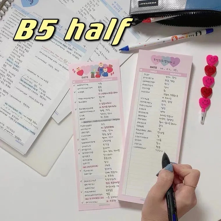Vertical half-B5 notepad with printed lines for English words, in blue cover.