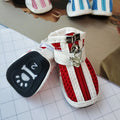 VIP Teddy Schnauzer blue cloth dog shoes with front zipper and non-slip sole, shown as a set of four.