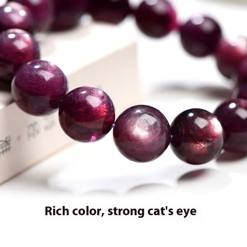 Purple lepidolite crystal bracelet with round polished beads showing selectable size options.