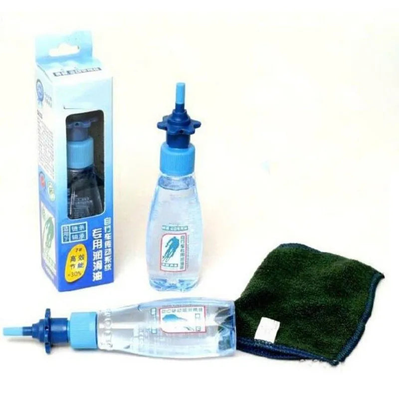 Blue 60ml bottle of Drip Less Bicycle Chain Lubricant with liquid plastic formula
