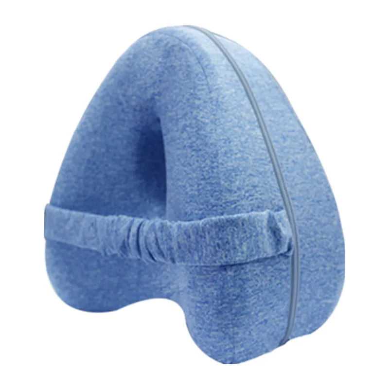 A dark blue jacquard love heart-shaped memory foam leg pillow for adults.