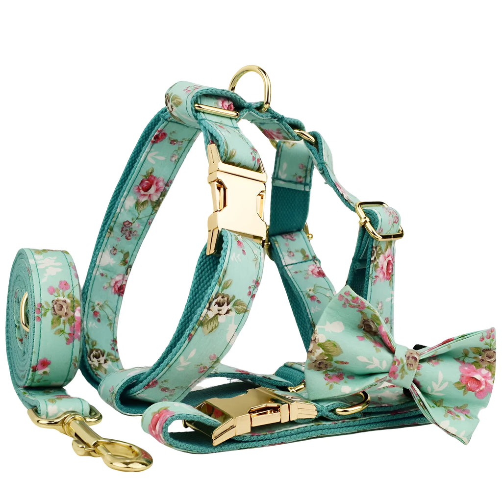 Fabric dog collar set with rose pattern detachable bow, matching leash, and optional vest in green background