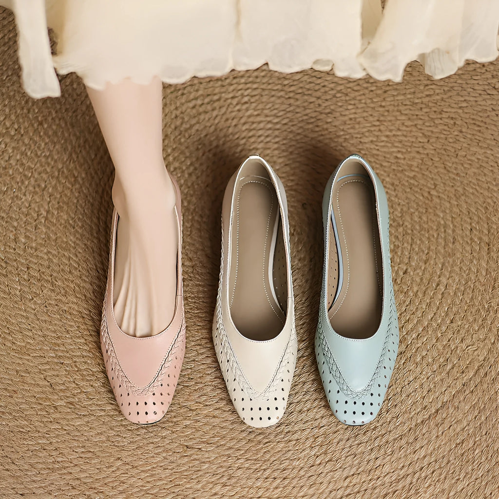 Women's milky white goat skin sandals with hollow-out design and beef tendon sole.