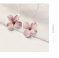 Pink and white flower shaped stud earrings for women with electroplated alloy finish