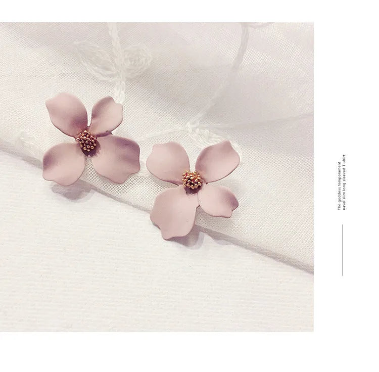 Pink and white flower shaped stud earrings for women with electroplated alloy finish