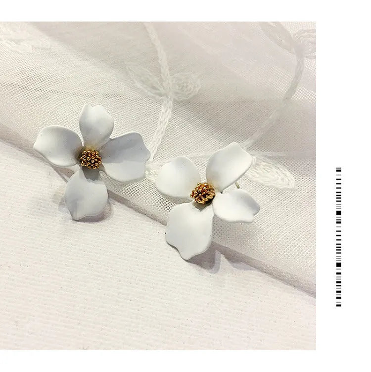 Flower-shaped stud earrings in pink and white colours with electroplated alloy construction