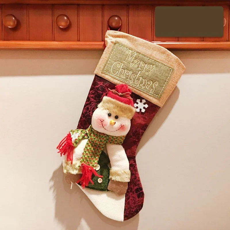 Handmade cloth Christmas stocking with 3D elk appliqué, large opening, and hanging loop.