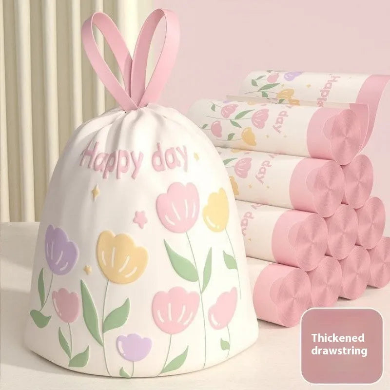 Pile of bold pink degradable drawstring garbage bags with argy wormwood.