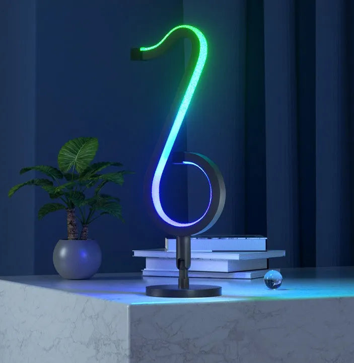 Black aluminium and iron intelligent APP remote control symphony atmosphere light with 180° rotation on a desktop