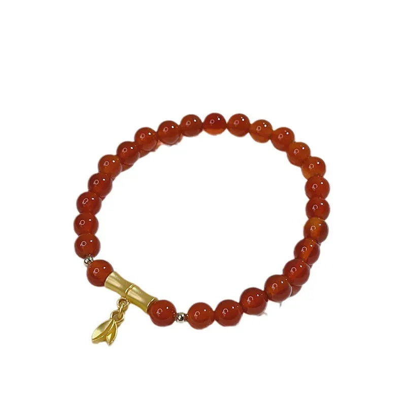 Handmade red agate bracelet with dragon design for women, Chinese style.