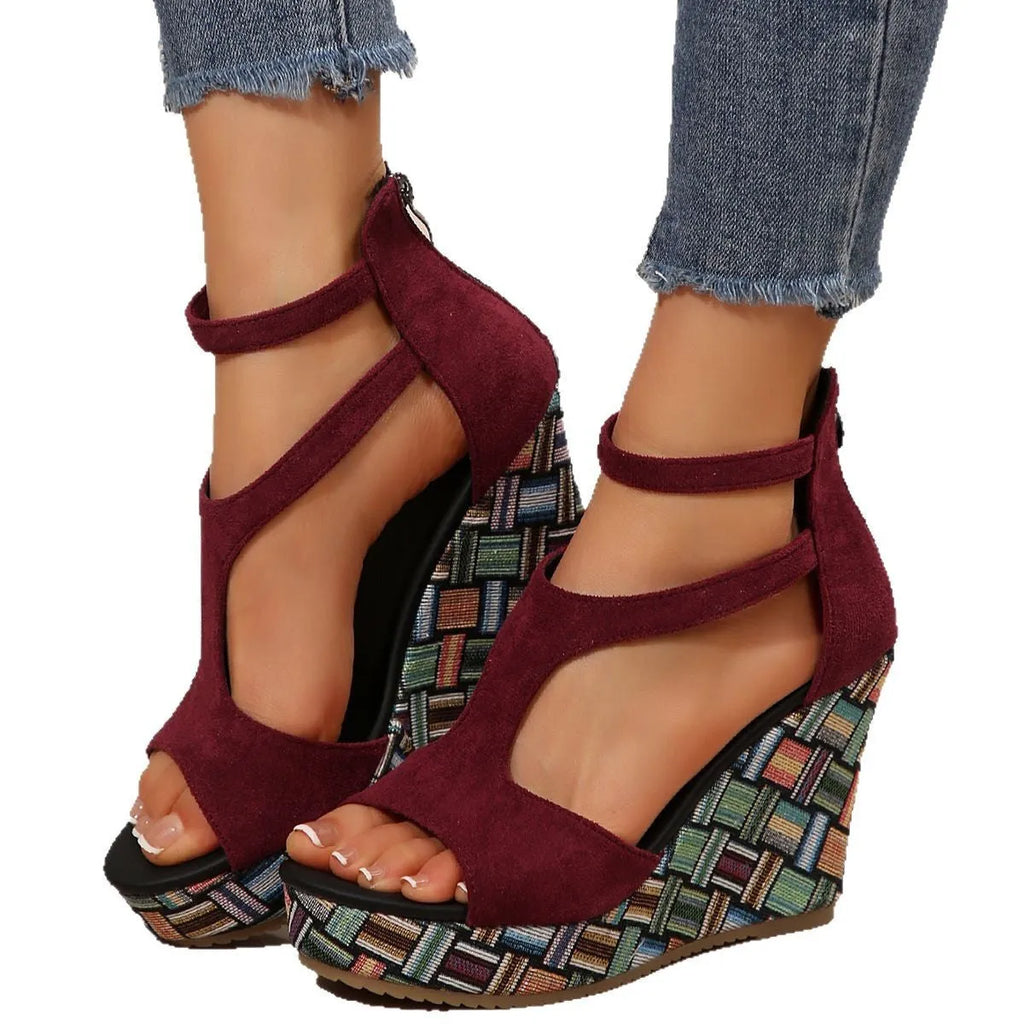 Women's cream white ankle-strap sandals with a buckle and thick rubber sole, shown from the side.