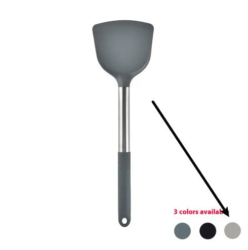 Silicone kitchen utensil set with twelve tools in a rotating white storage caddy on a counter.