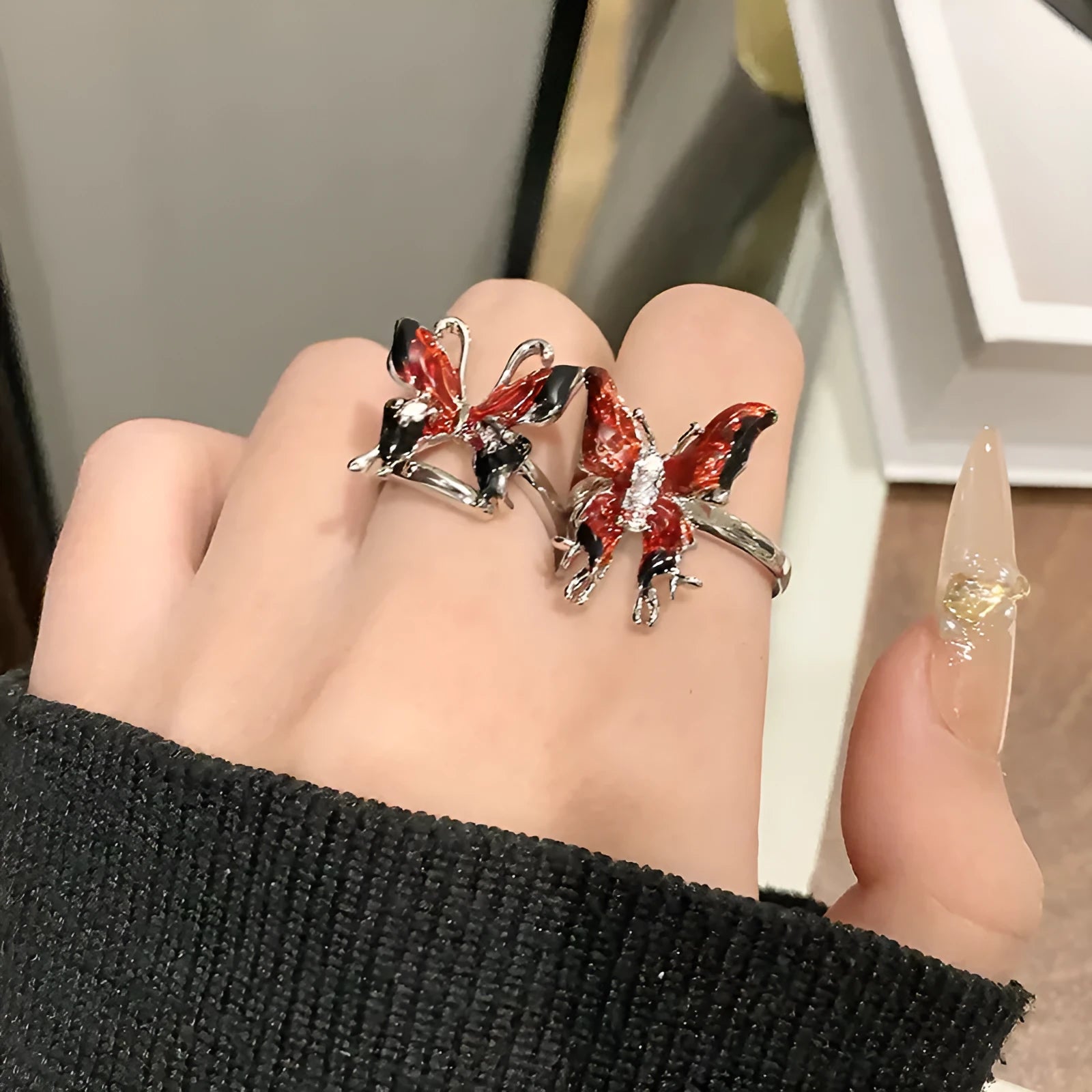 Simple copper women's ring with a Chinese butterfly design, showing an example from the 33 available numbered styles.