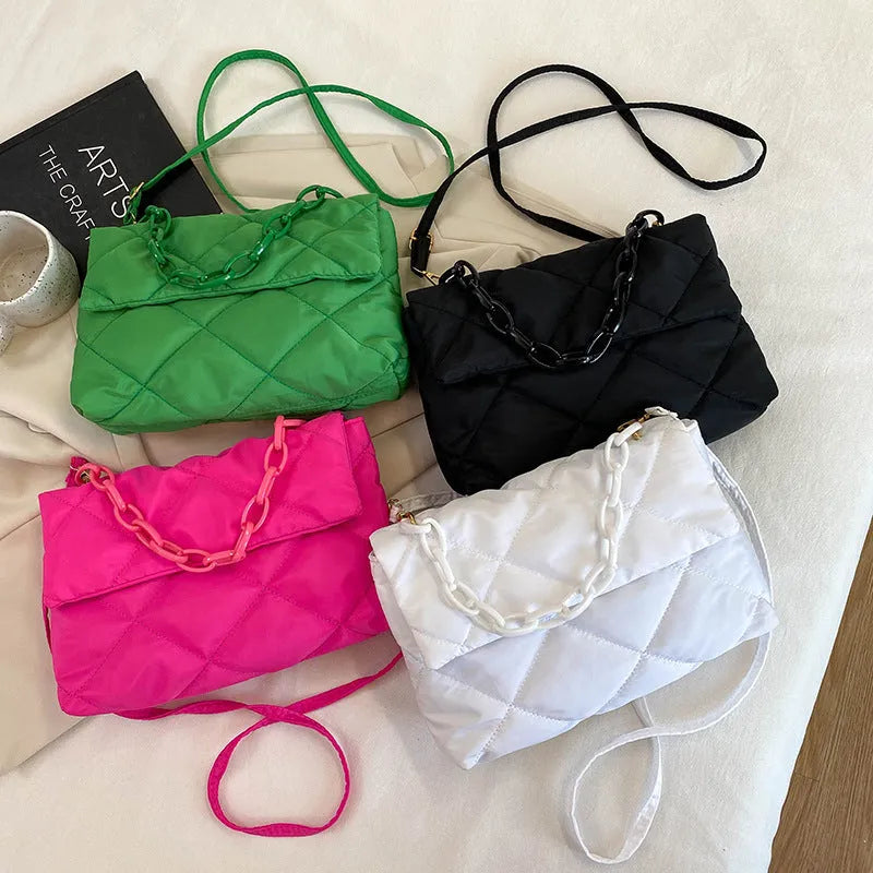 Nylon diagonal cross texture diamond grid handbag in solid colour with chain detail, available in black, green, rose red, and white, 29x19x7 cm