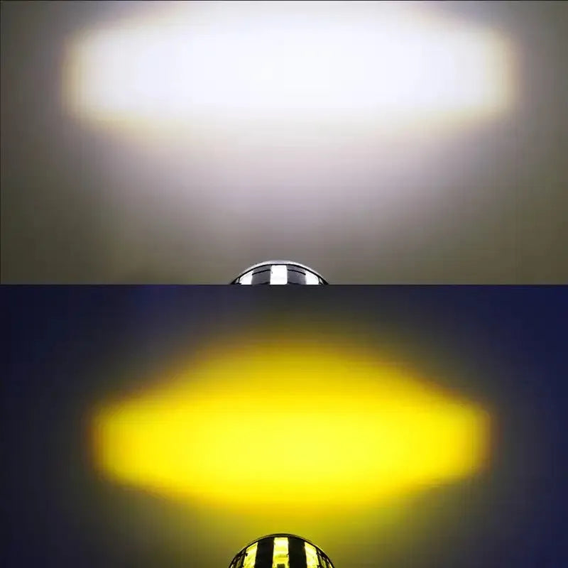 Motorcycle auxiliary spotlight with two-colour lens options, showing aluminium and polycarbonate housing.