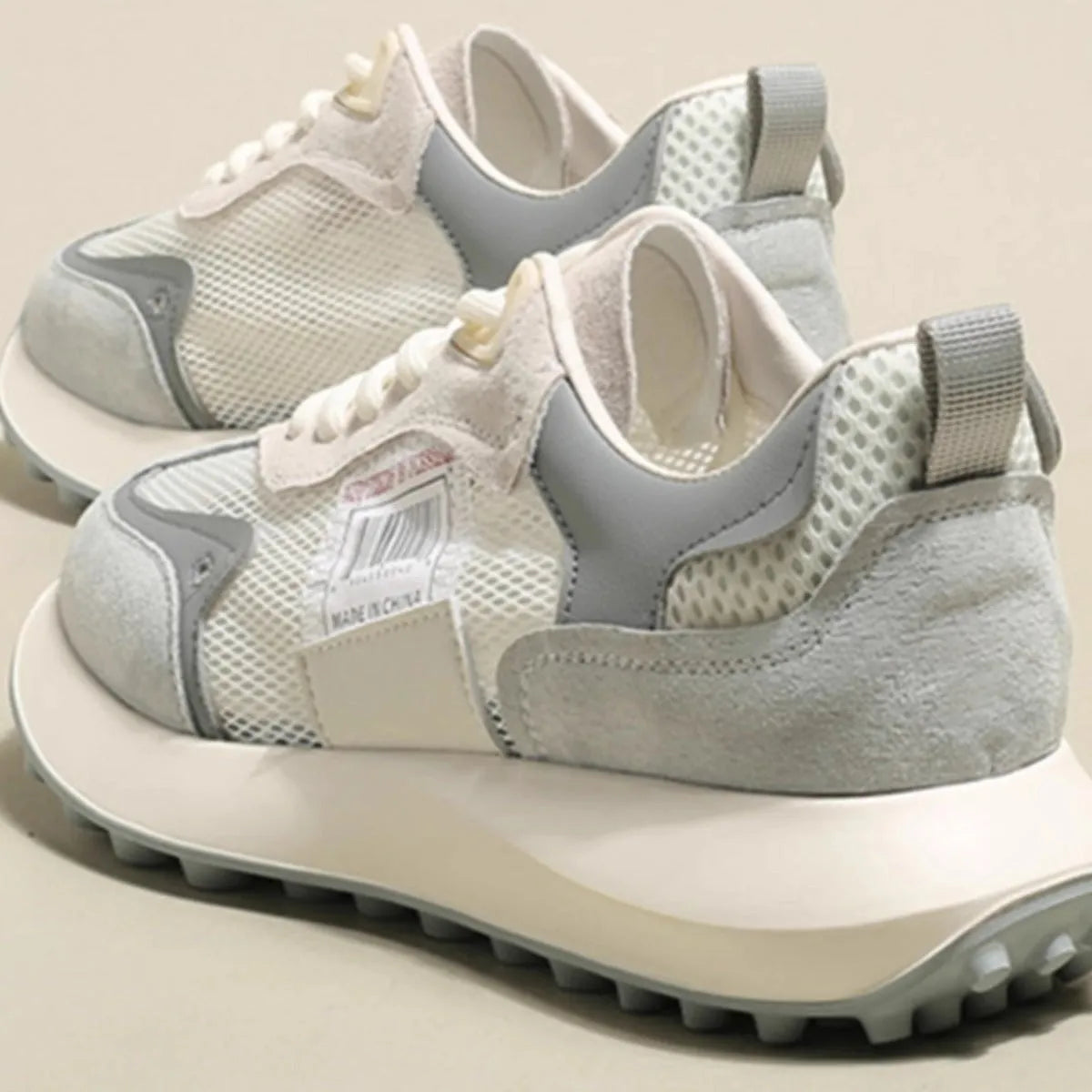 Women's grey retro low-top sneakers with round toe and flat rubber sole
