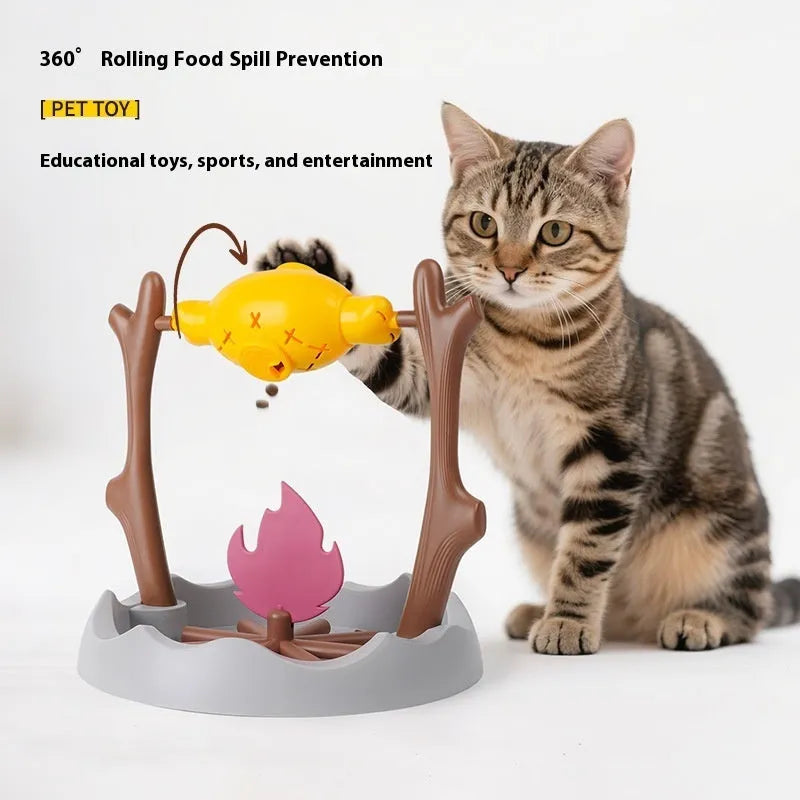 Tumbling barbecue design cat feeder toy with food compartments measuring 30x30x29cm