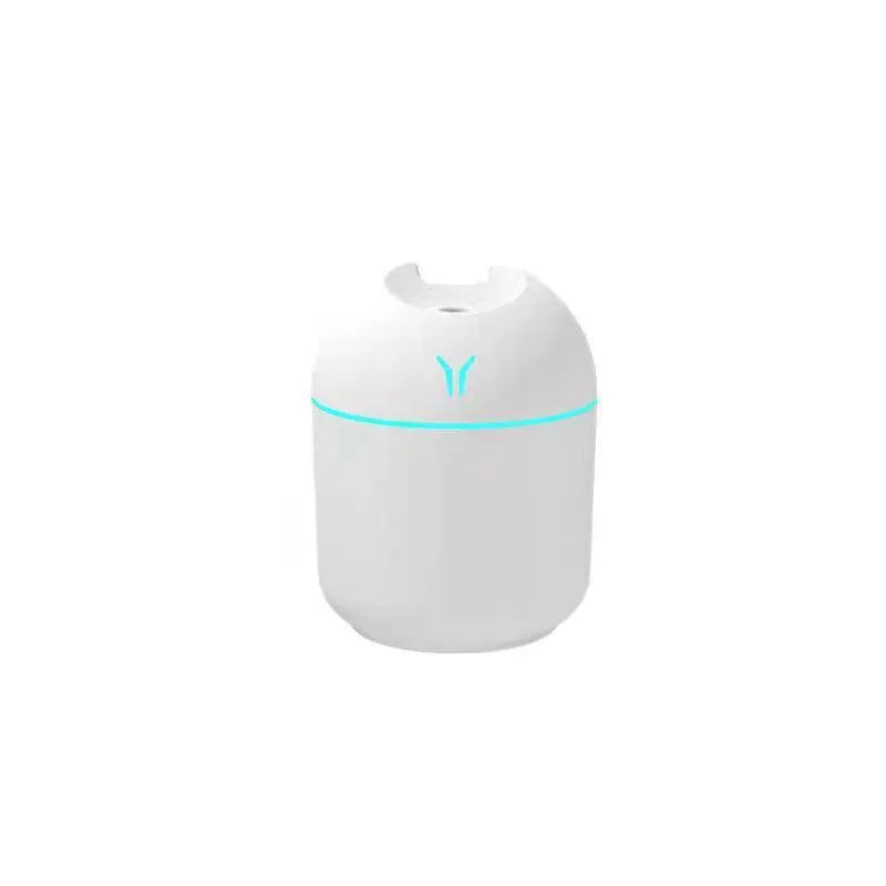 Round desktop humidifier with USB cable and water tank in ivory white, sky blue, or girlish pink colours.