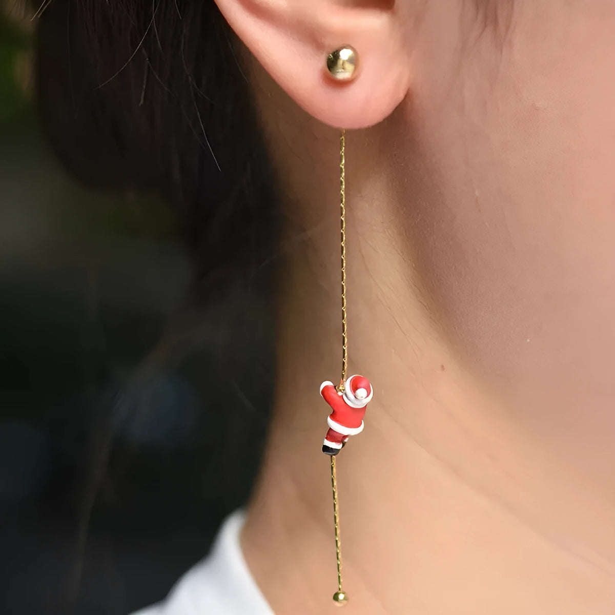 Asymmetric crawling Santa Christmas earrings for women in zinc alloy with inlaid diamond detail