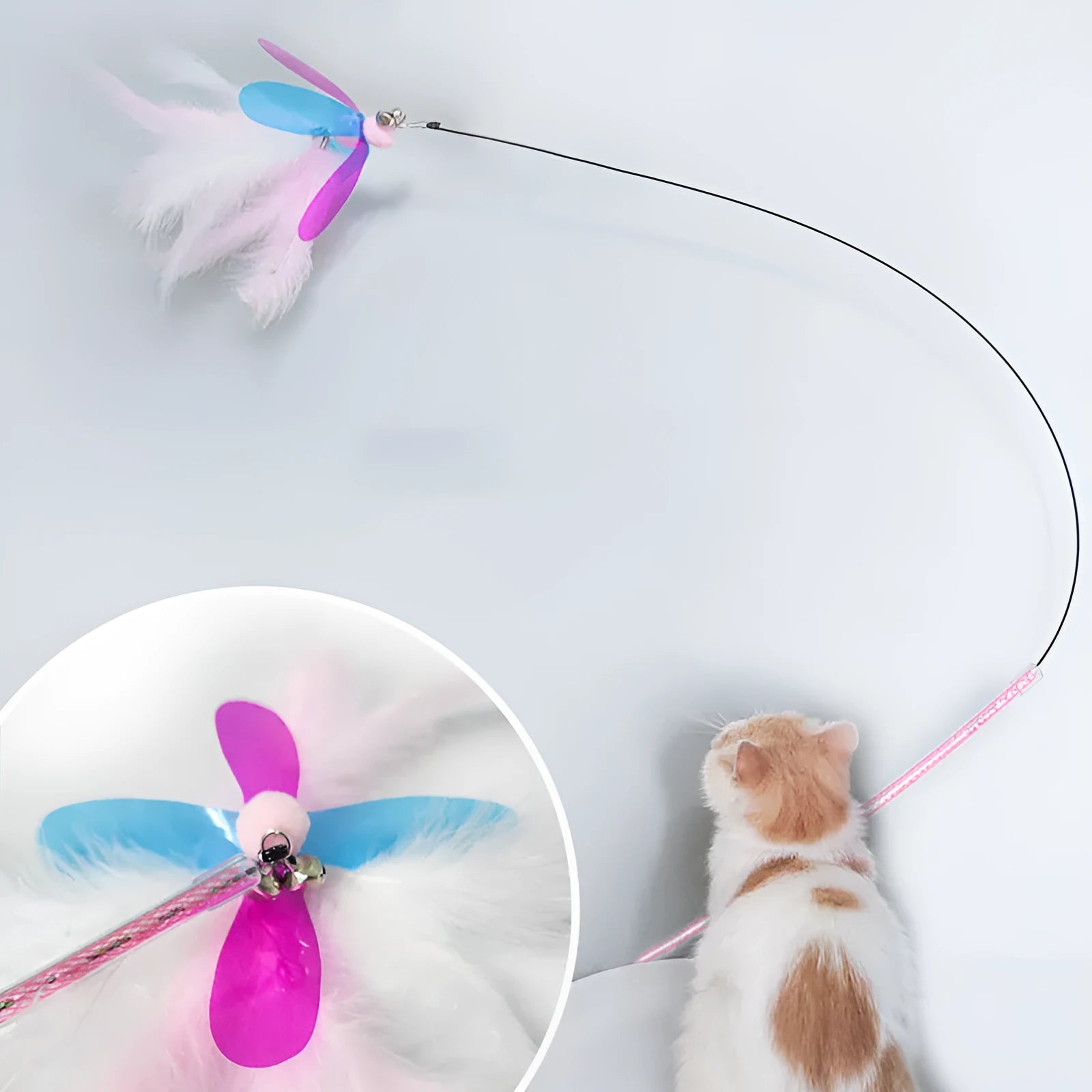 Fairy Feather retractable cat toy with large fluffy feather head and PVC pole, on a white background