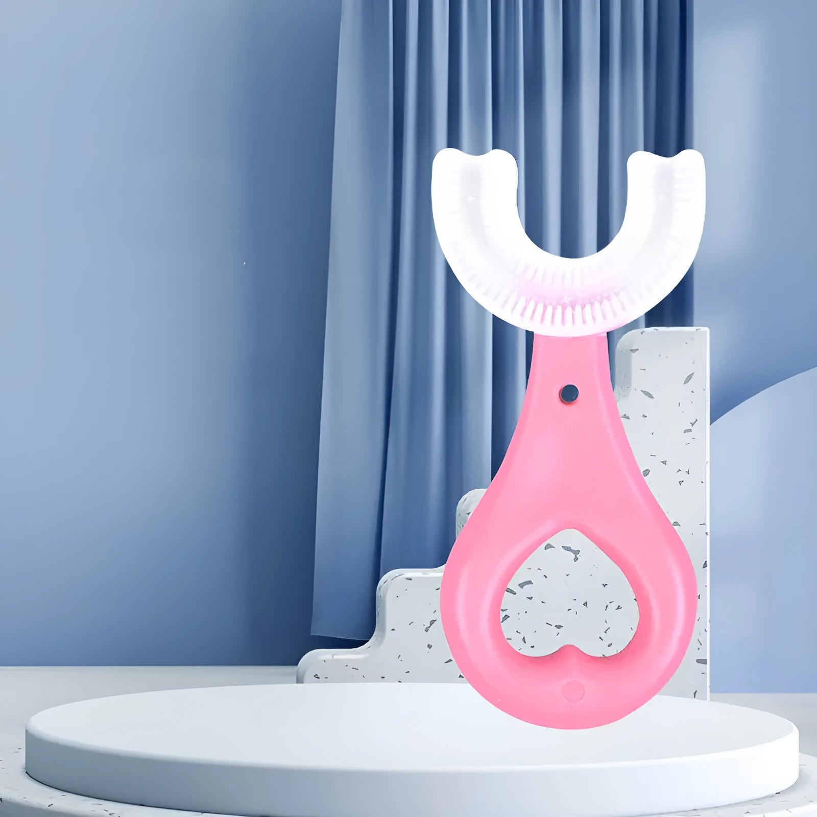 Children's U-shaped food grade soft rubber toothbrush in pink and blue colours for ages 2-6 and 6-12 years