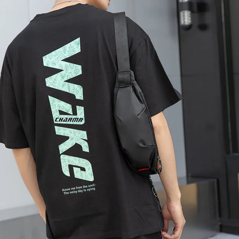 Black oxford cloth waist pack showing front zip and interior phone and ID pockets.